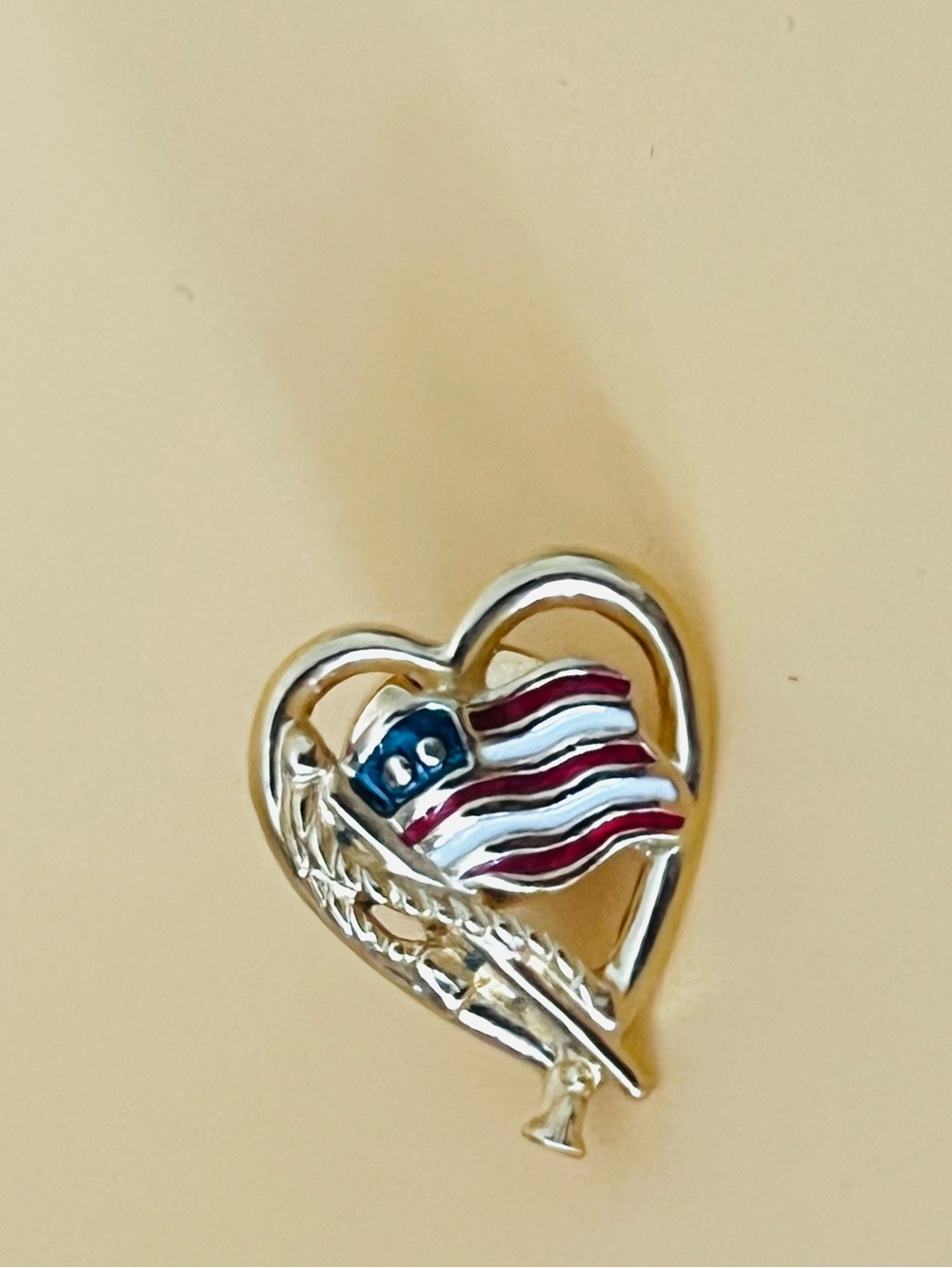 Vintage Avon heart lapel gold tone